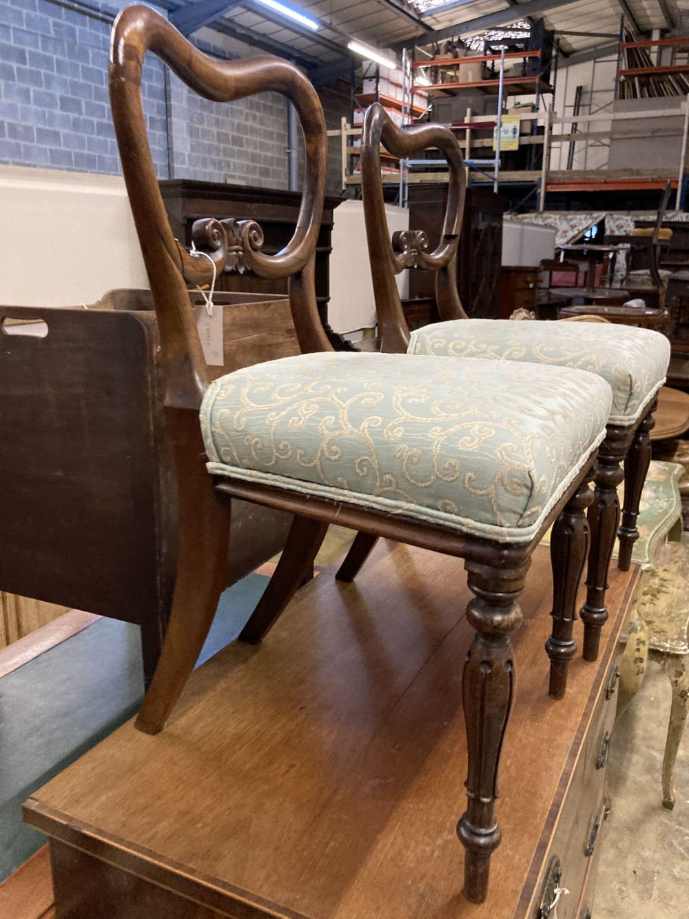 A pair of early Victorian rosewood dining chairs (a.f.)